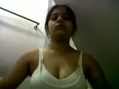 Beautiful Indian brunette amateur with busty perversion takes off her clothes and shows off her muff.